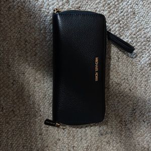 Michael Kors black satchel with matching wallet